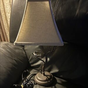 Rustic Brown Table Lamp with Cream Shade. Bird nest with branches for the base.
